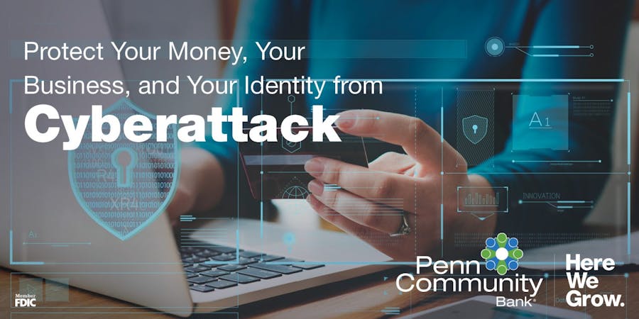 protect your money and bank account from cyber attacked with penn community bank, image of hands looking at a debit card at a laptop